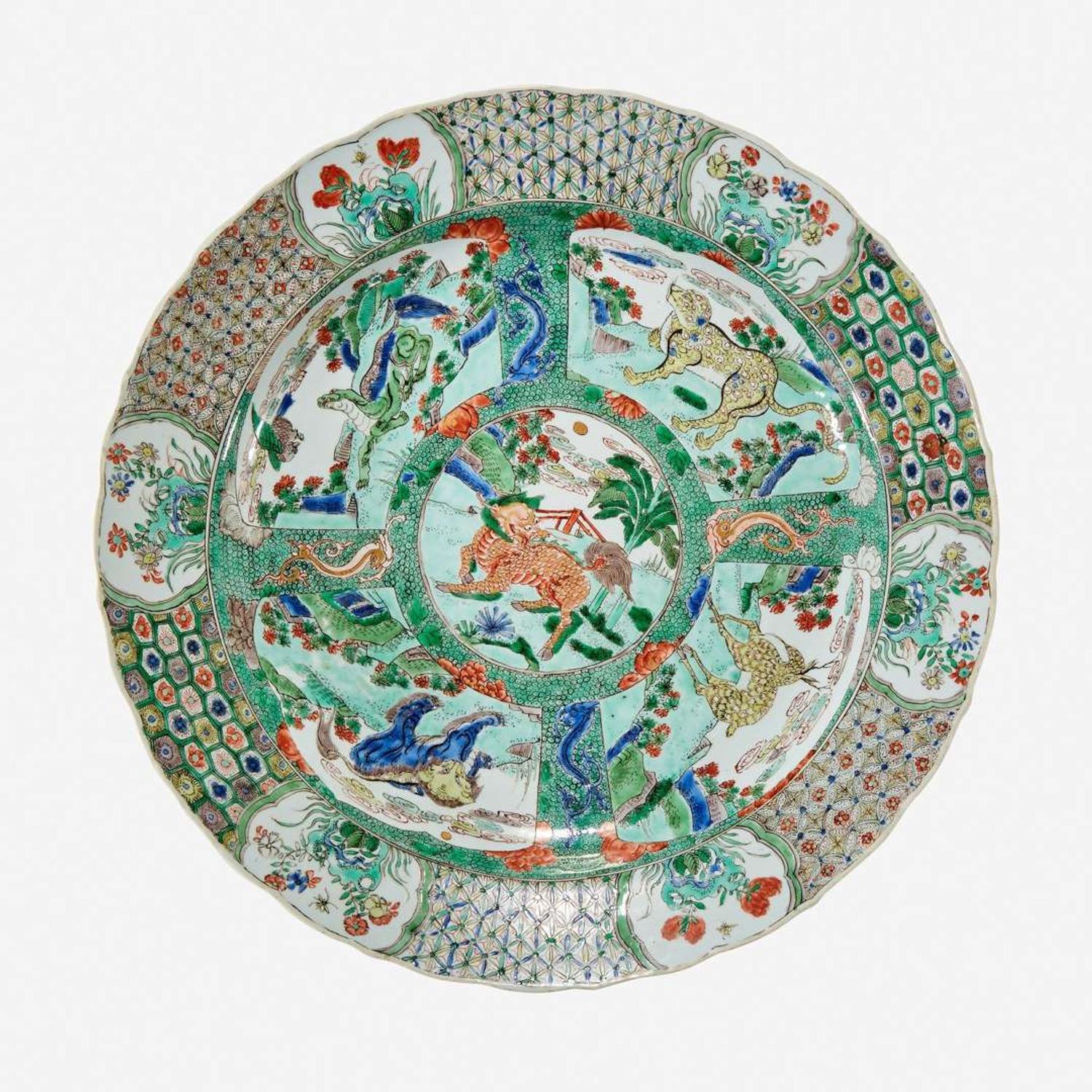 A Chinese famille verte-decorated "Mythical Beasts" porcelain charger Kangxi period