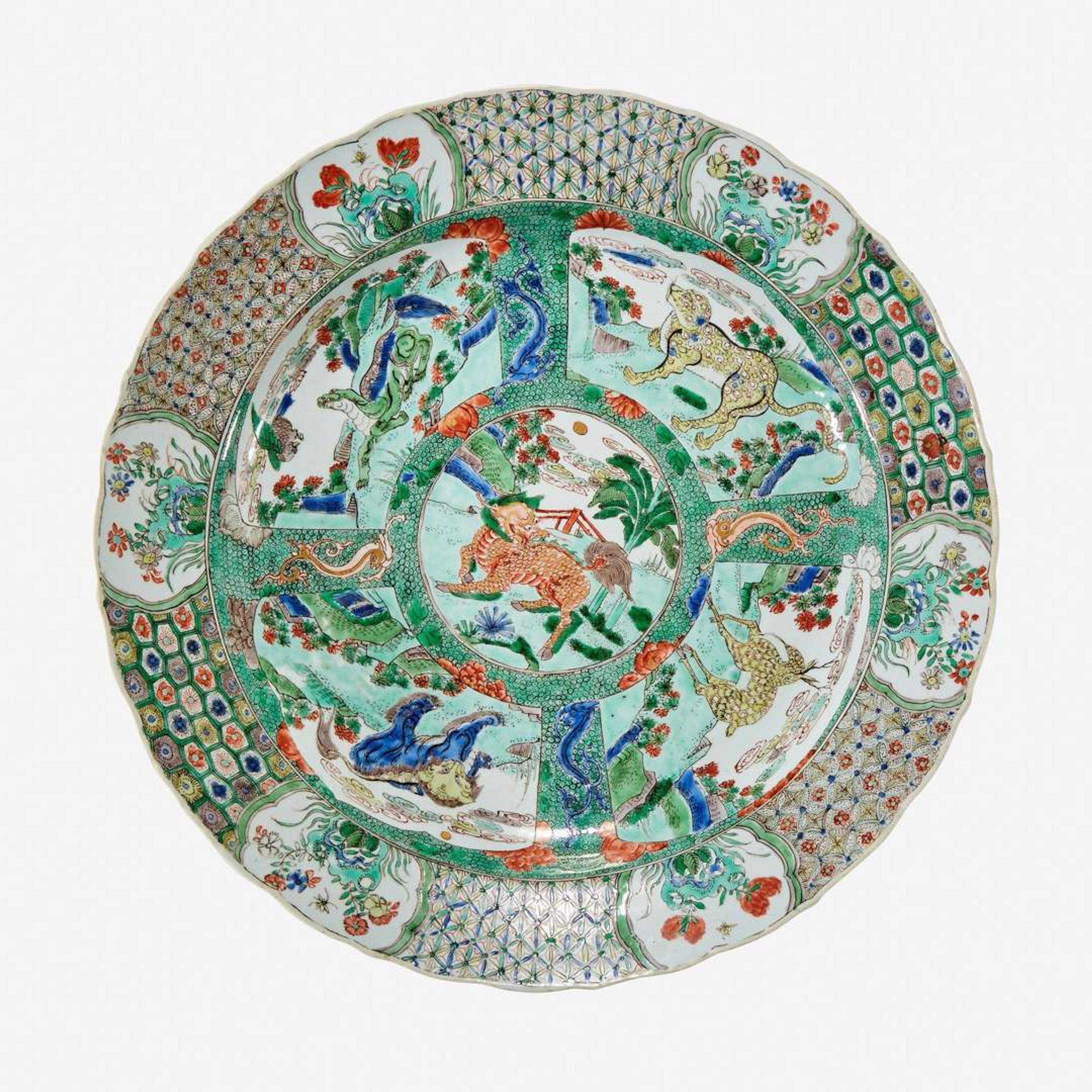 A Chinese famille verte-decorated "Mythical Beasts" porcelain charger Kangxi period