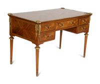 A Louis XVI Style Gilt-Bronze Mounted Mahogany Bureau Plat