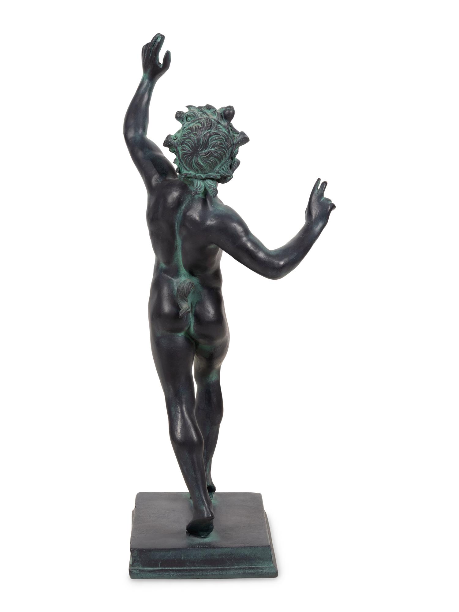A Patinated Cast Resin Figure of the Faun of Pompeii