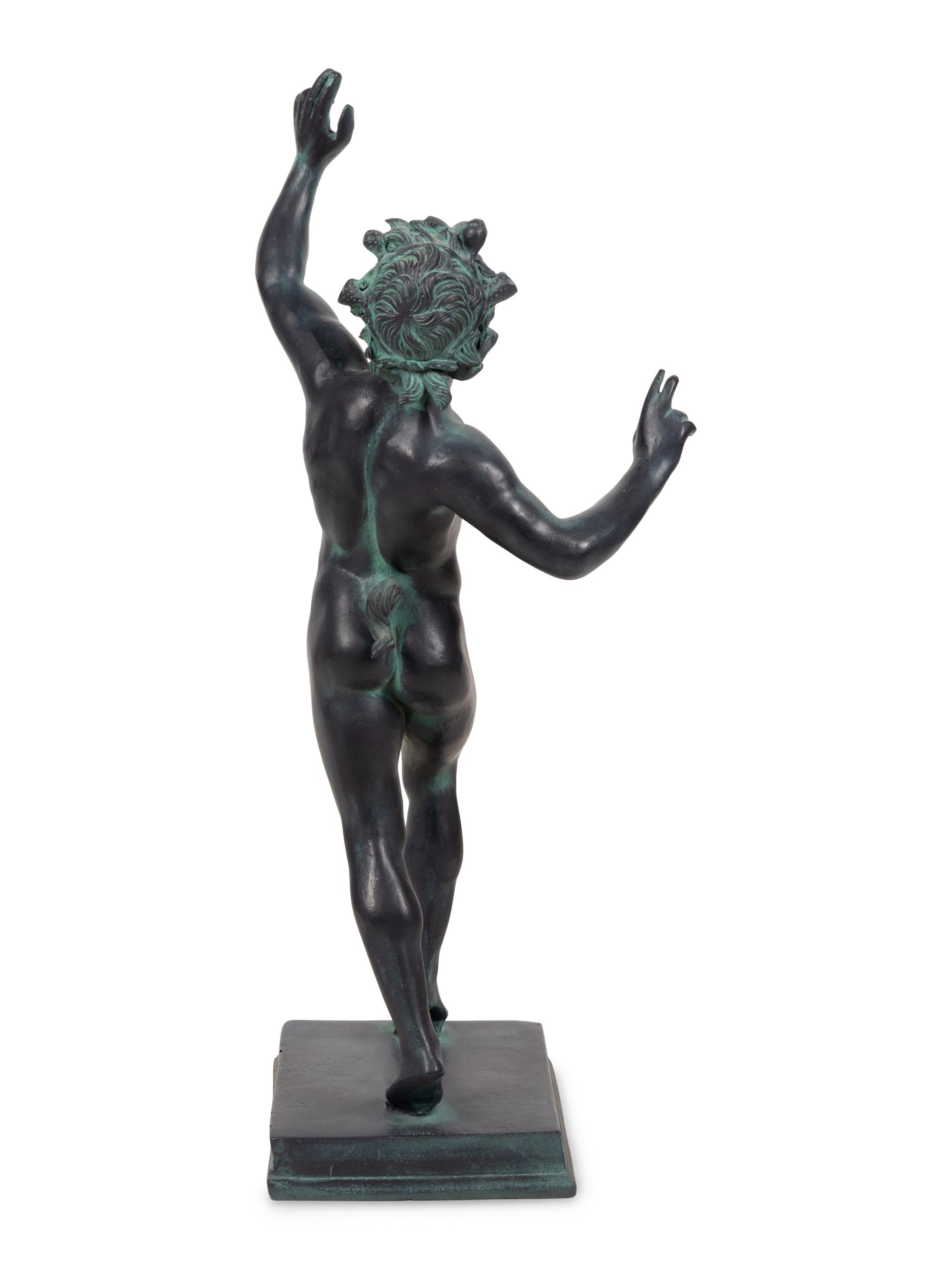 A Patinated Cast Resin Figure of the Faun of Pompeii