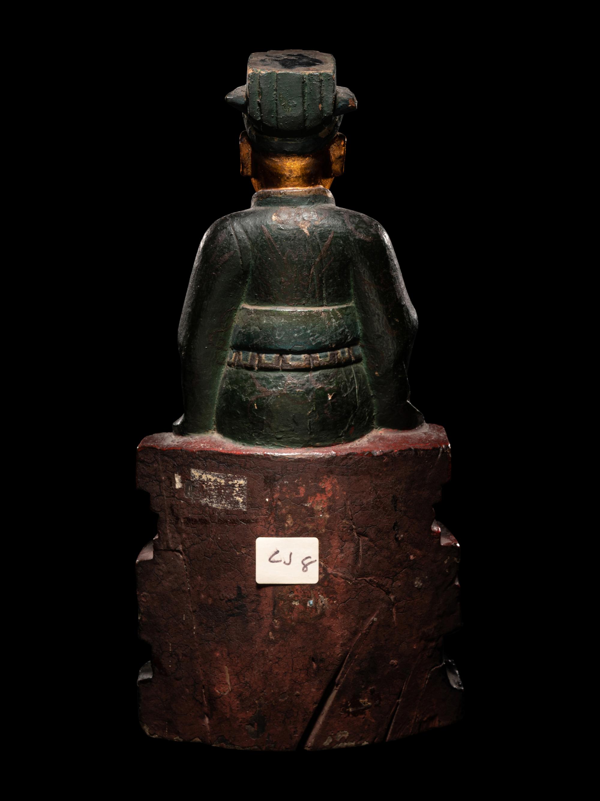 A Chinese Gilt, Red, and Black Lacquered Wood Figure of an Official