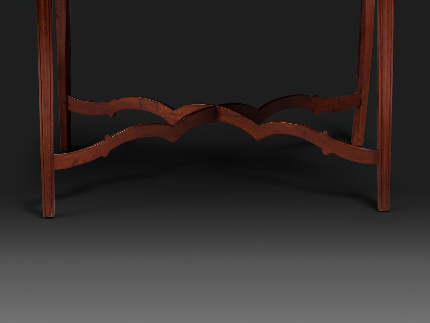 A Late Chippendale Carved Cherrywood Stretcher-Base Pembroke Table
