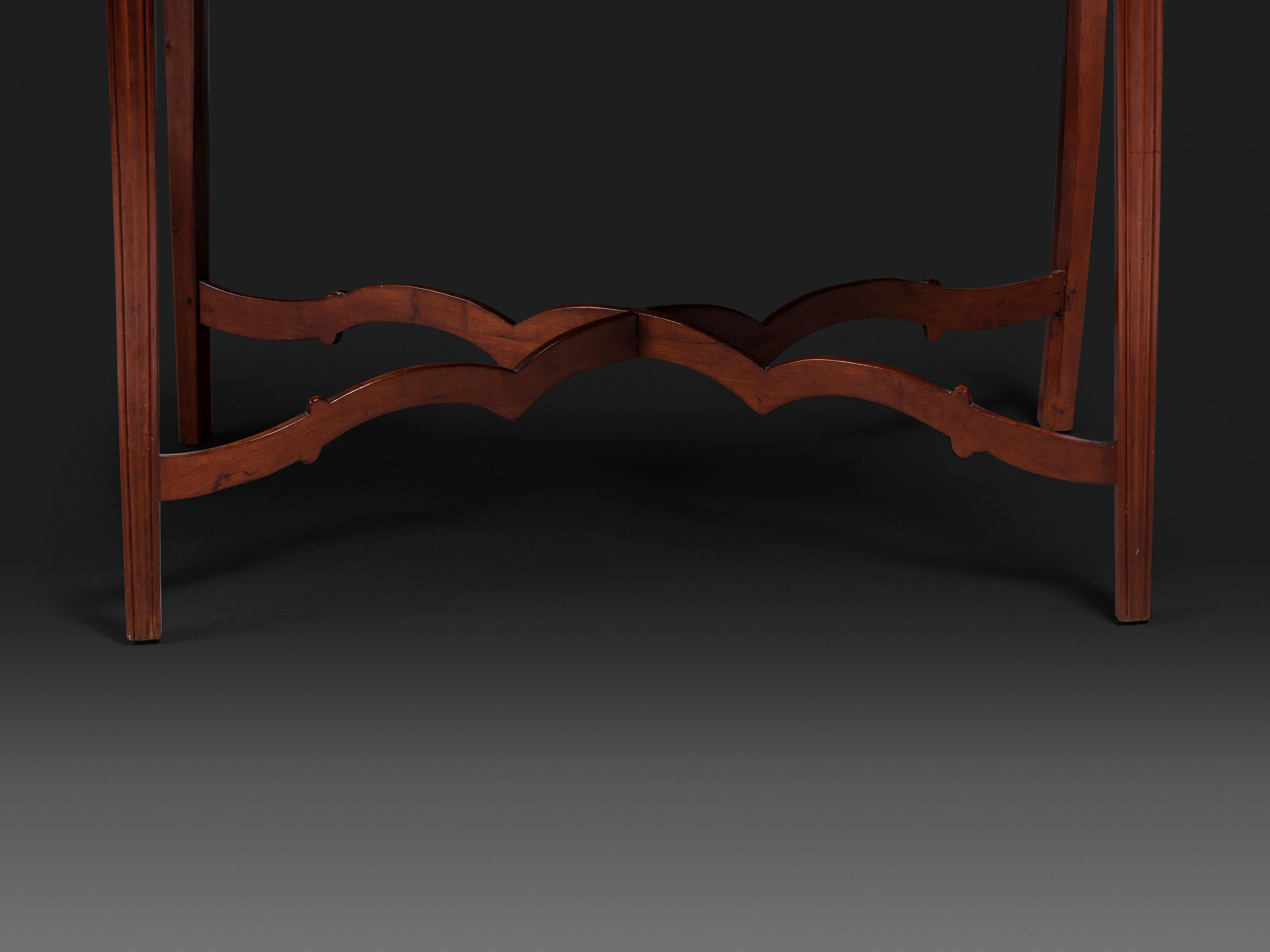 A Late Chippendale Carved Cherrywood Stretcher-Base Pembroke Table