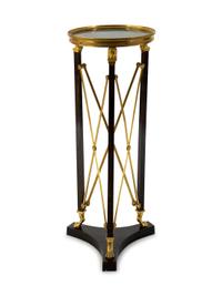 A French Empire Style Gilt Bronze and Ebonized Marble Top Pedestal Table — 20TH CENTURY