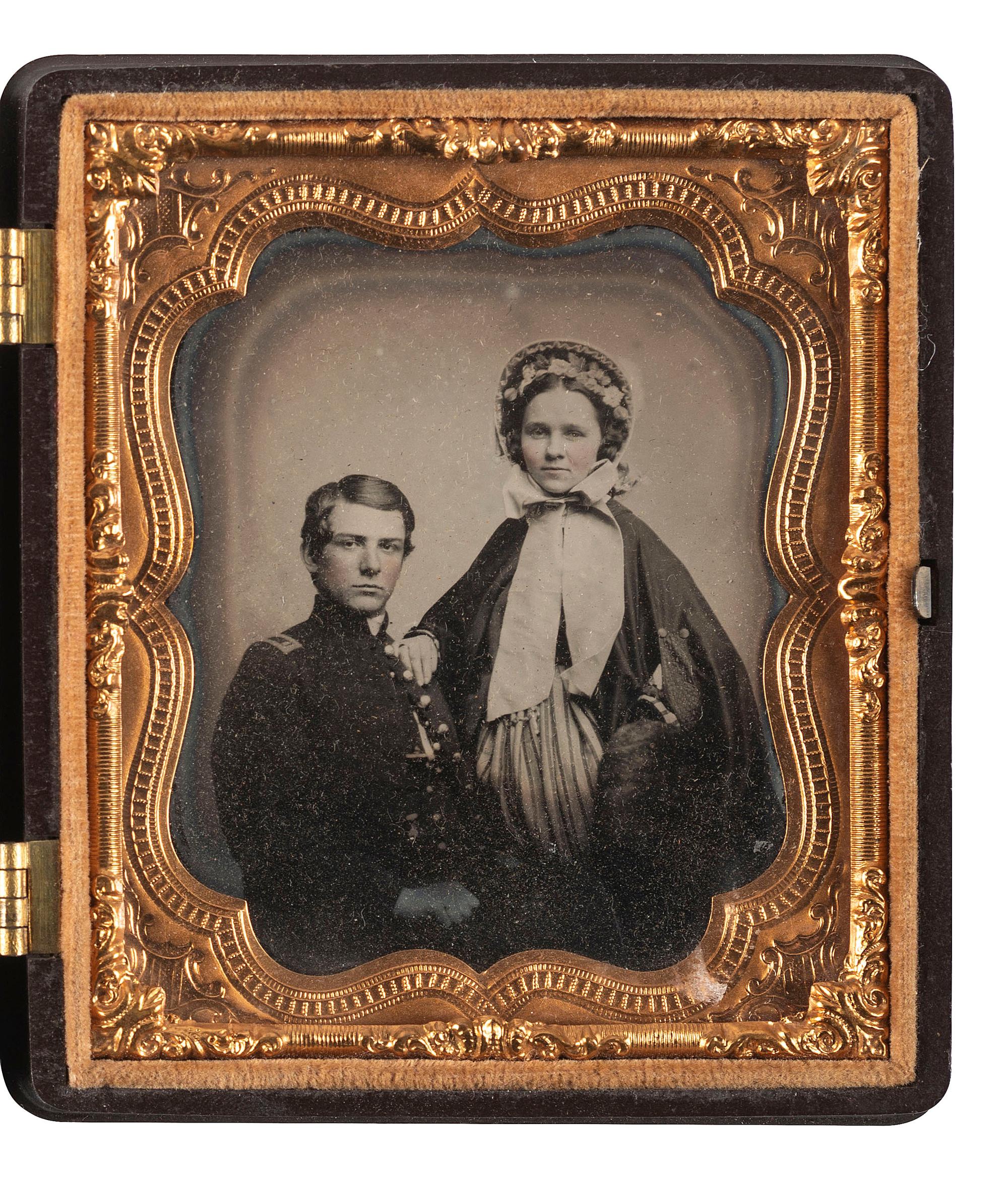 [CIVIL WAR]. Sixth plate ruby ambrotype featuring a first lieutenant of infantry with his wife.