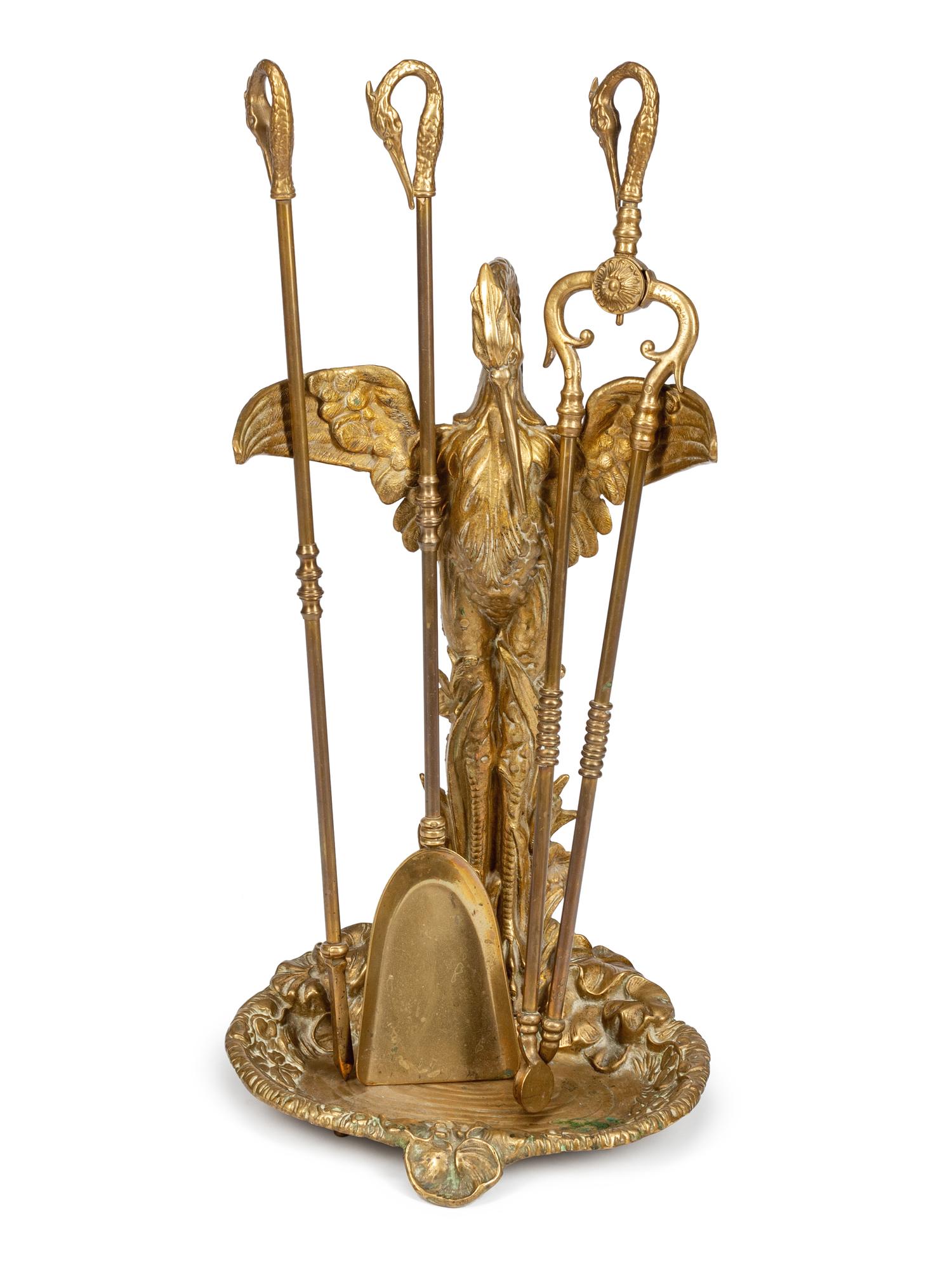 A Set of Continental Gilt Bronze Fireplace Tools