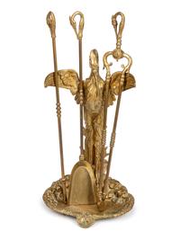 A Set of Continental Gilt Bronze Fireplace Tools