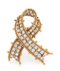 A Platinum, 18 Karat Yellow Gold and Diamond Bow Motif Brooch, 17.70 dwts.