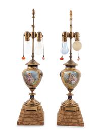 A Pair of Sèvres Style Porcelain Urns Mounted as Lamps