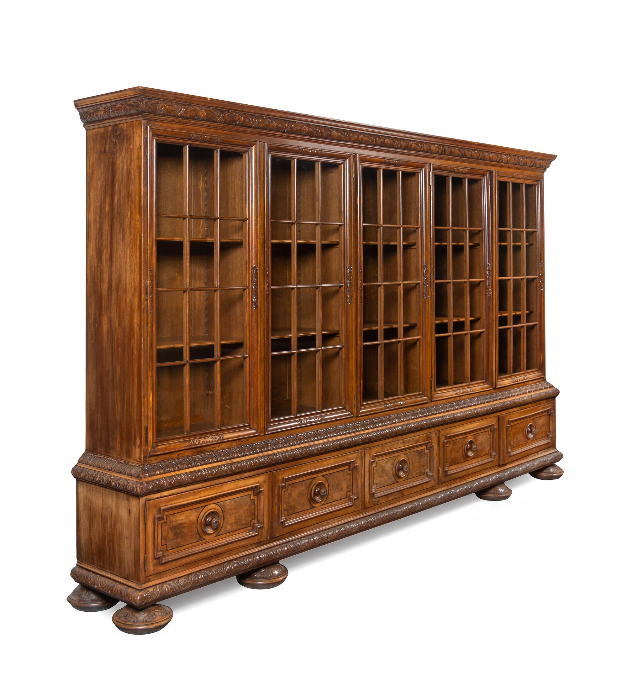A Renaissance Revival Carved Walnut Vitrine Cabinet