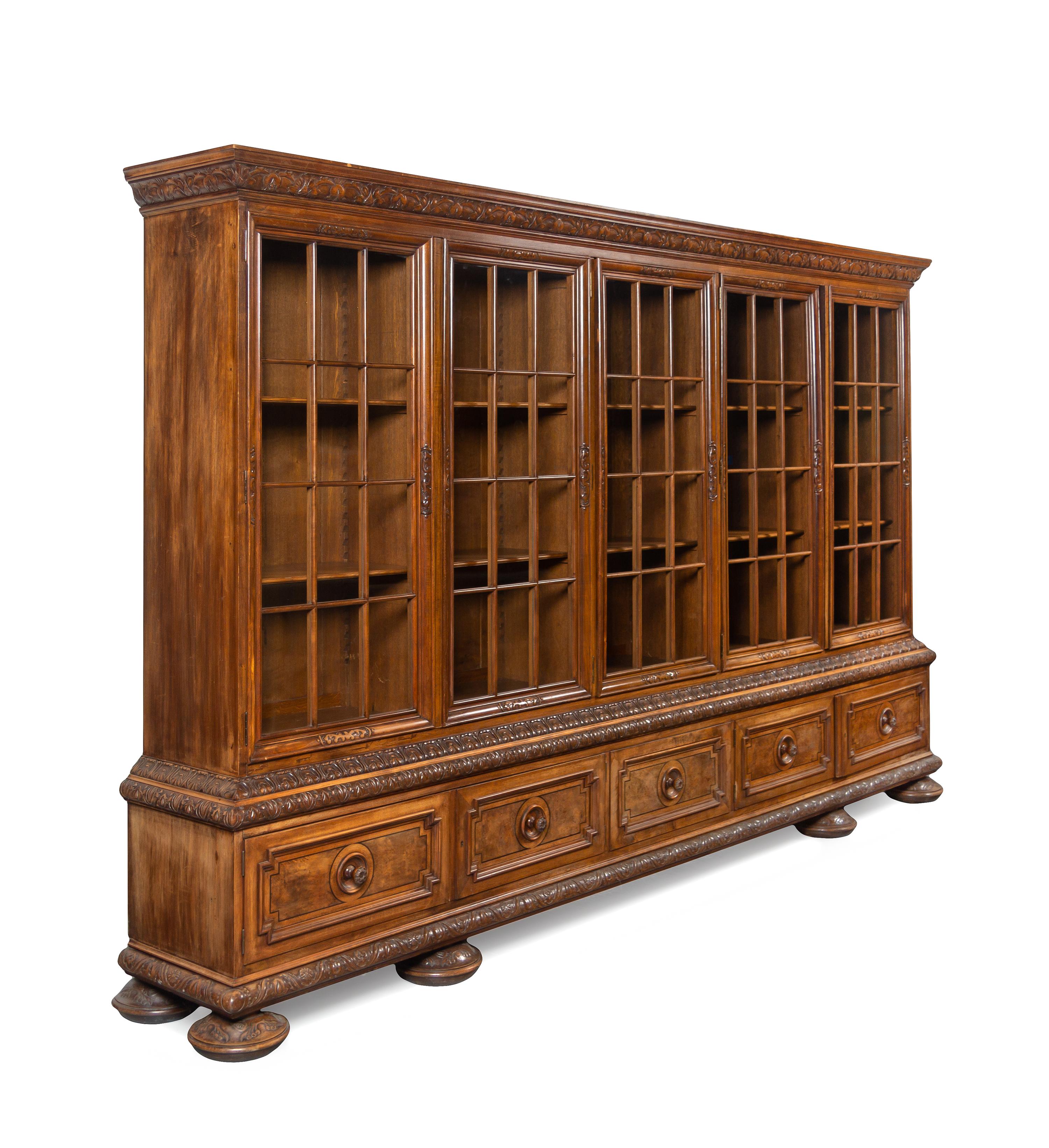 A Renaissance Revival Carved Walnut Vitrine Cabinet