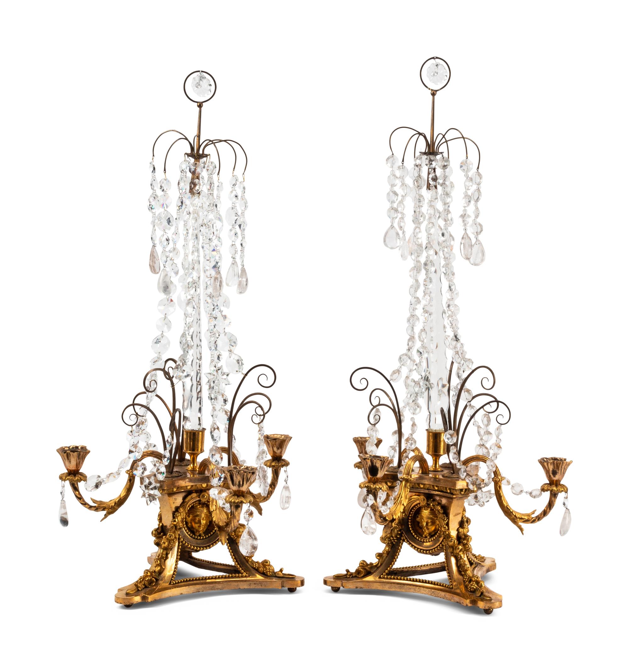 A Pair of French Gilt Bronze, Cut Glass and Rock Crystal Three-Light Candelabra