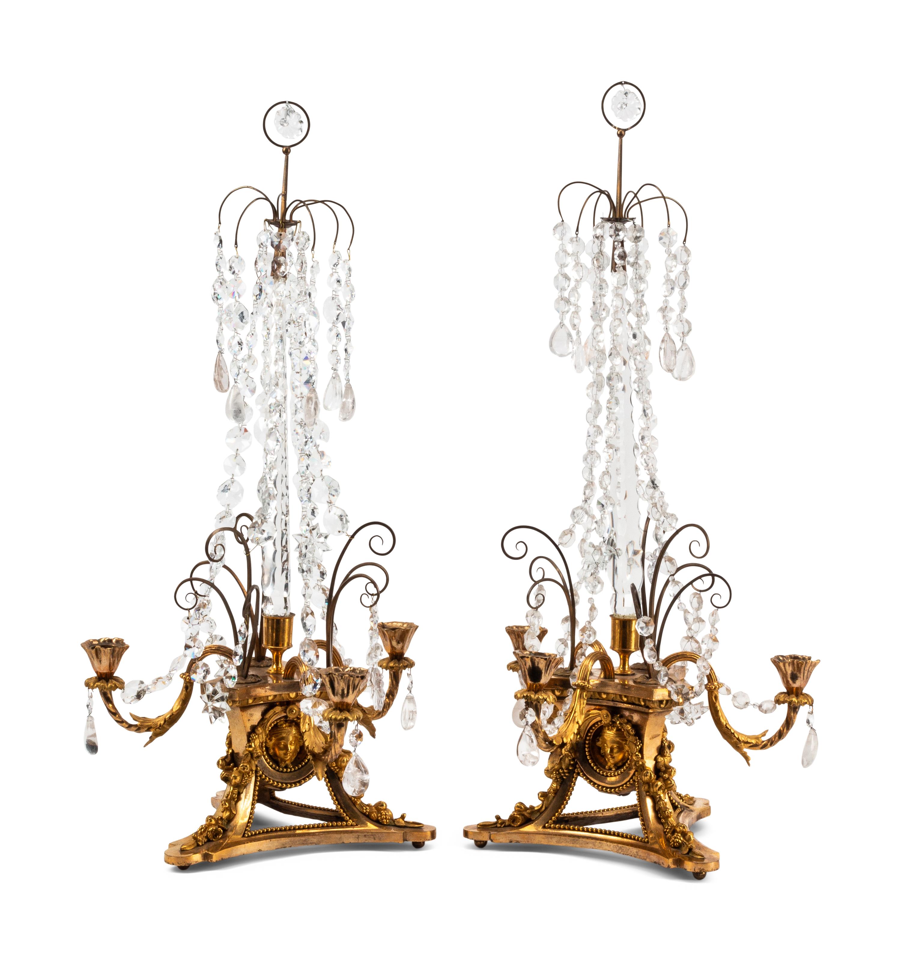 A Pair of French Gilt Bronze, Cut Glass and Rock Crystal Three-Light Candelabra