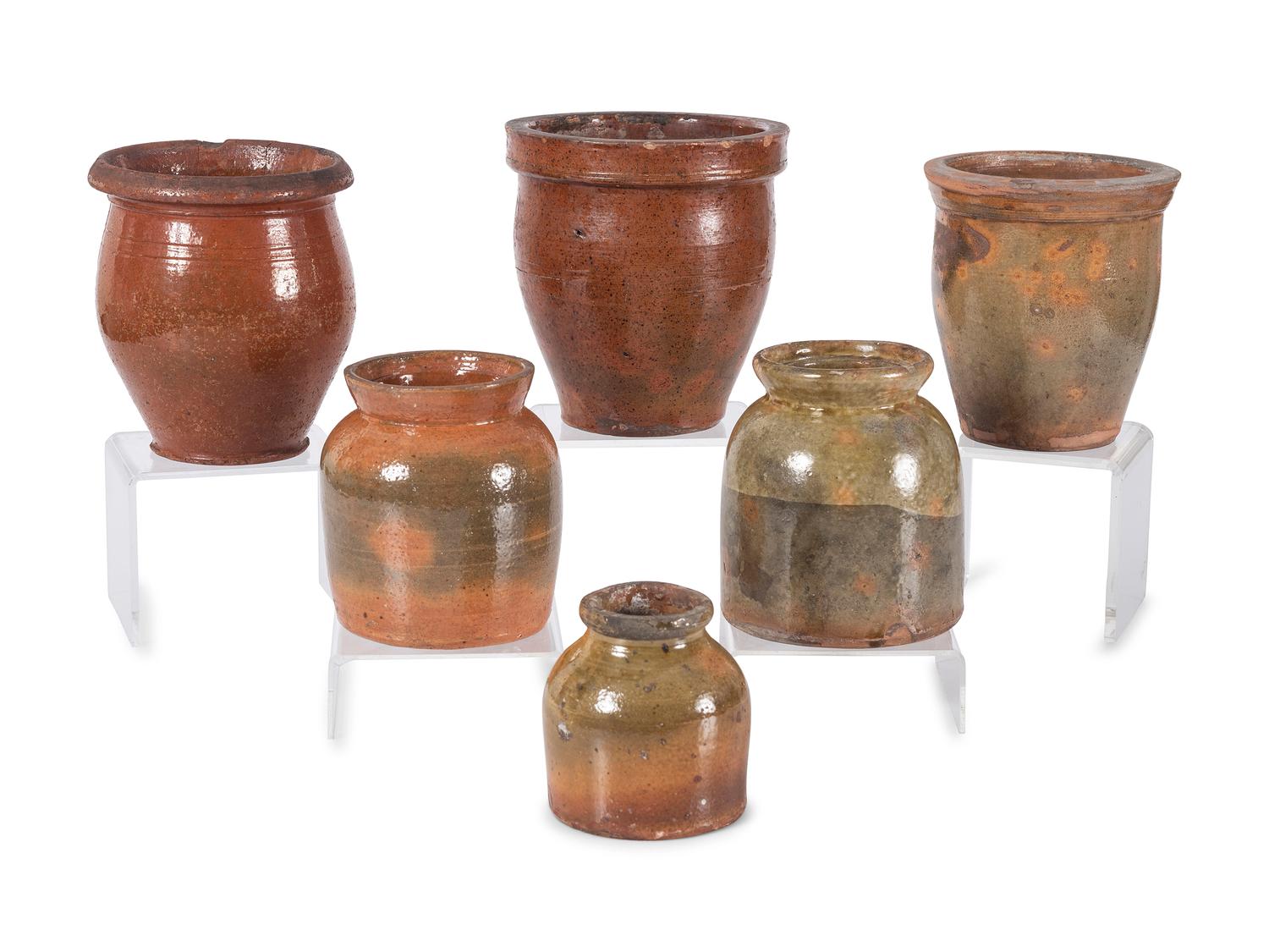 Six Galena Glaze Redware Jars