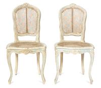 A Pair of Louis XV Cane Back Painted Side Chairs Height 35 1/2 inches. — 20TH CENTURY