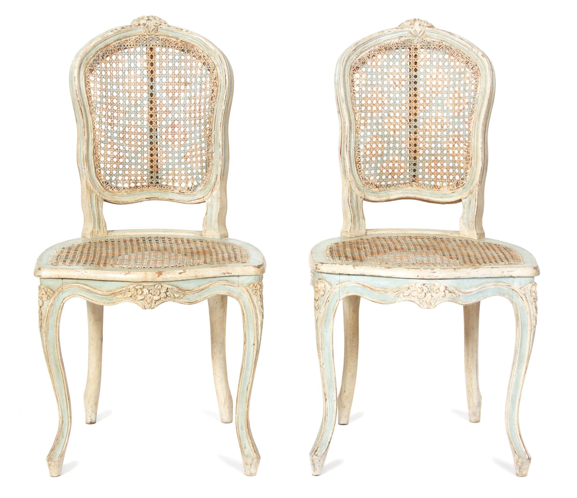 A Pair of Louis XV Cane Back Painted Side Chairs Height 35 1/2 inches. — 20TH CENTURY