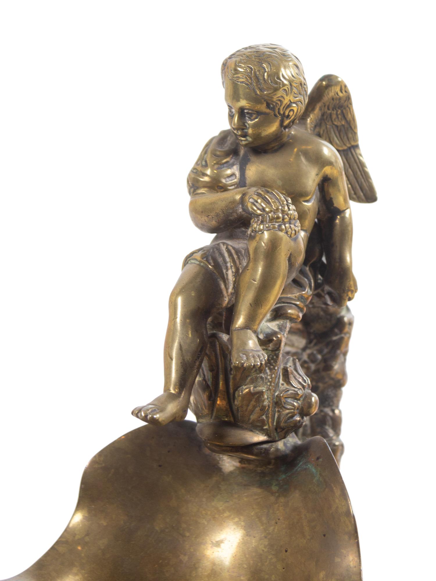 A Pair of Neoclassical Brass Ewers