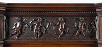 An Italian Renaissance Revival Carved Walnut Cabinet