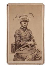 [NATIVE AMERICAN]. CDV studio portrait of a Sioux warrior. N.p.: n.p., [ca 1878].