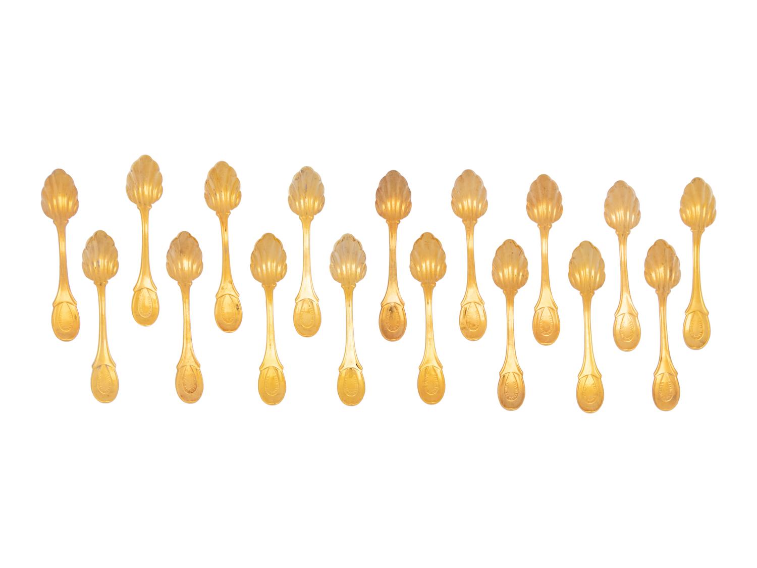 A Set of Twenty-One Gilt Metal Dessert Spoons