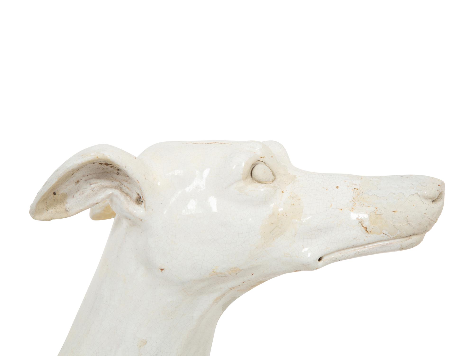 An Italian Glazed Earthenware Greyhound