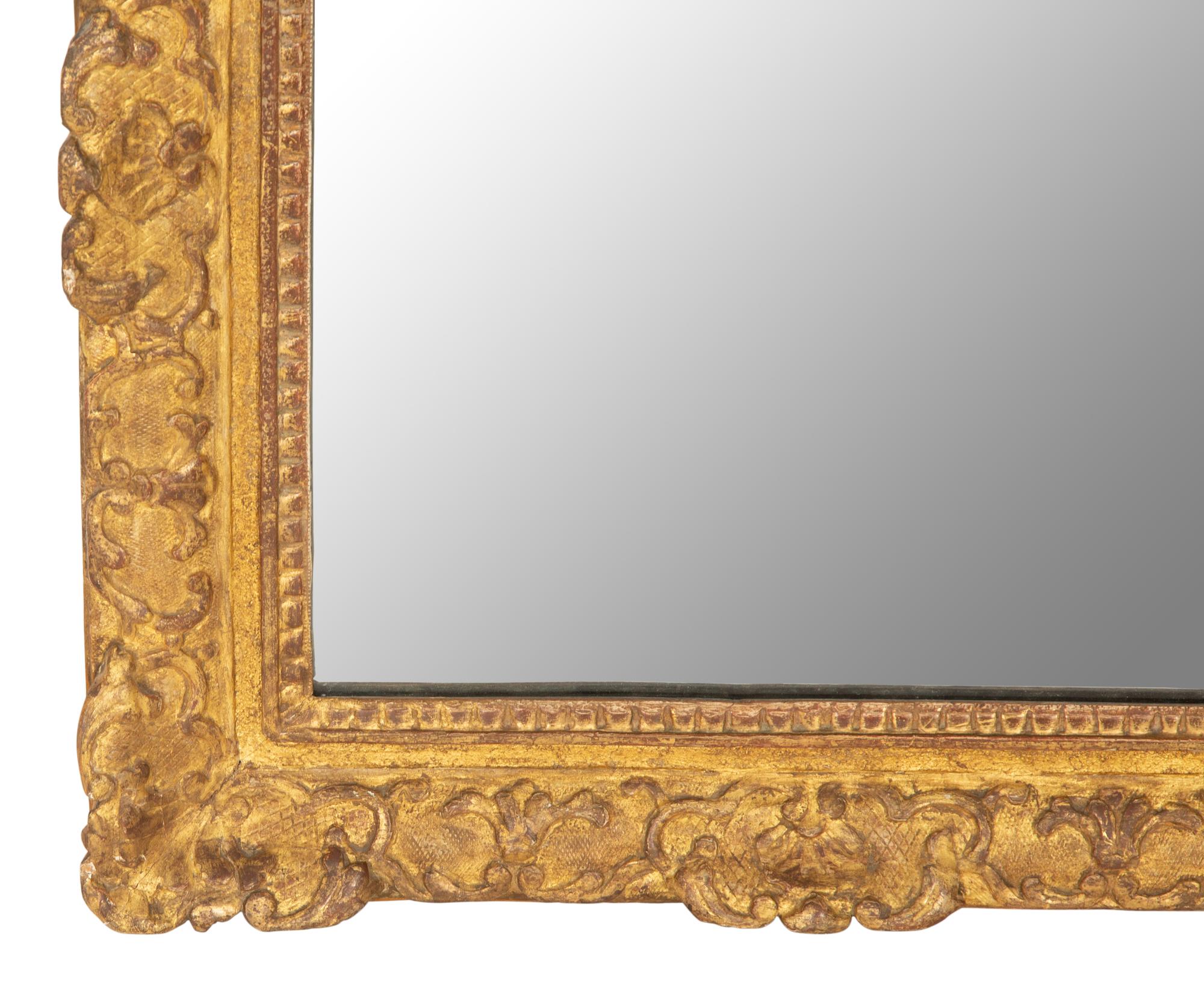 A Continental Carved Giltwood Wall Mirror