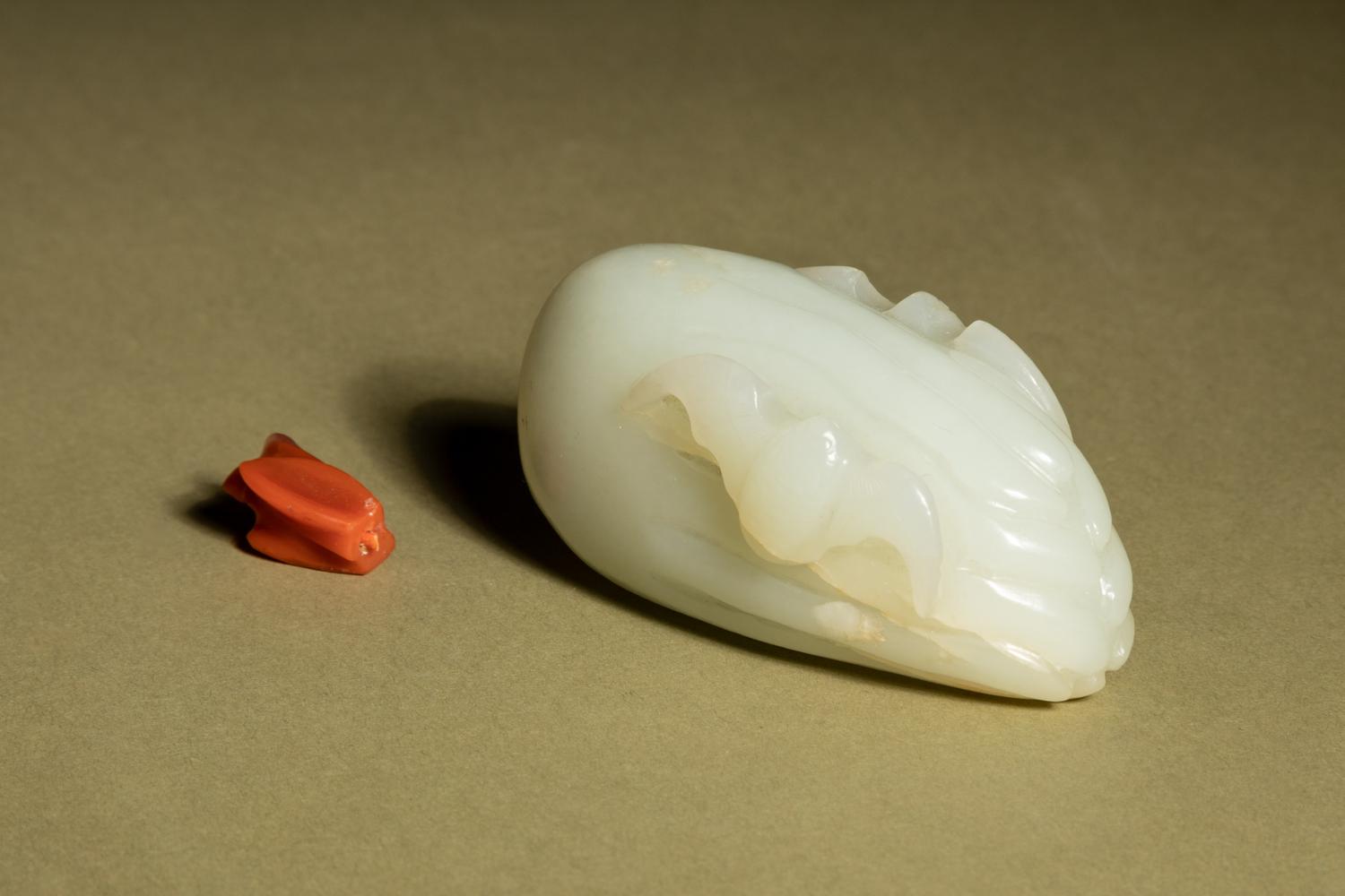 A White Jade 'Bat and Citron' Snuff Bottle