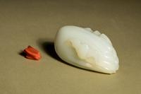 A White Jade 'Bat and Citron' Snuff Bottle