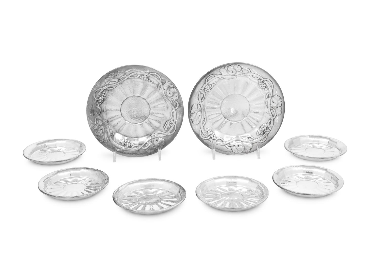 A Pair of Georg Jensen Silver Wine Coasters and Six Stem Coasters