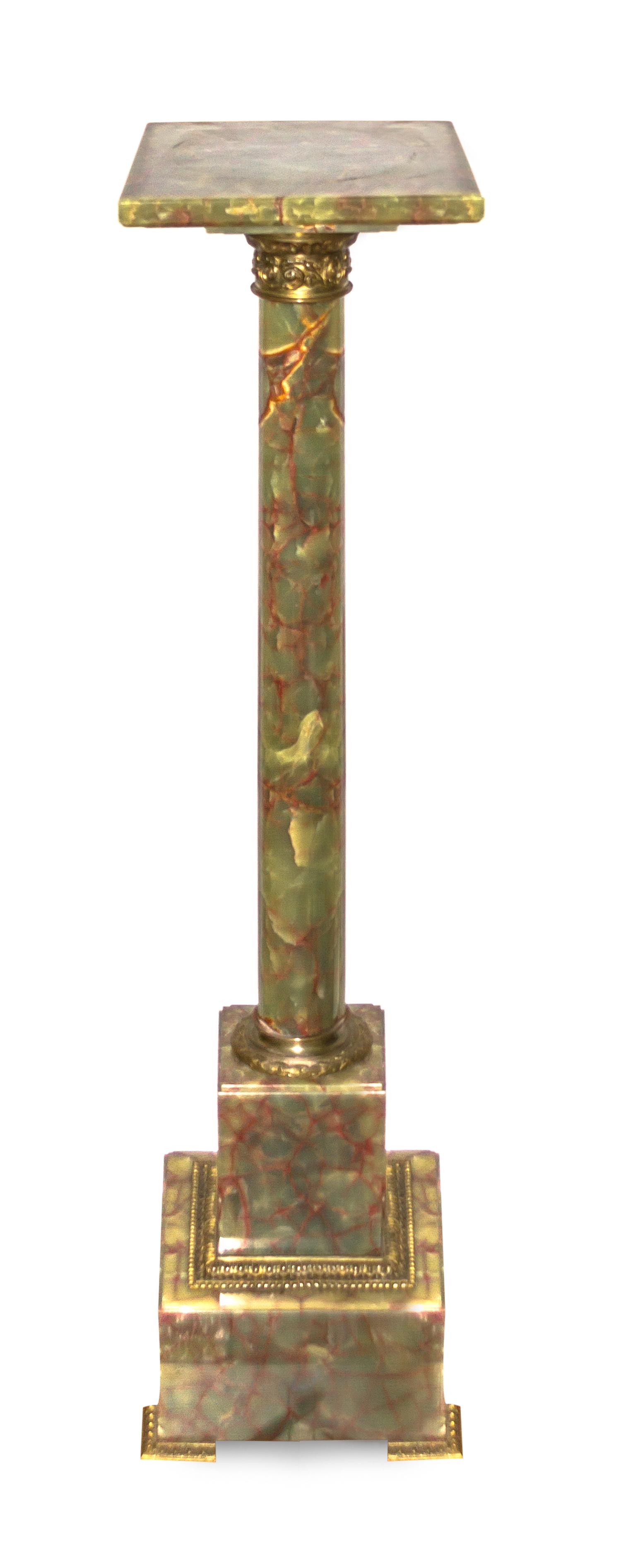 A Continental Gilt Metal Mounted Onyx Pedestal, Height 41 3/4 inches.