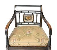 A Pair of Regency Style Open Armchairs