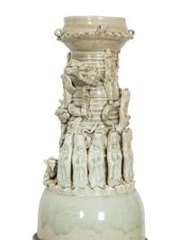 A Pair of Chinese Celadon-Glazed Funerary Urns Raised on Composition Pedestals