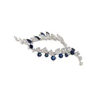 DIAMOND AND SAPPHIRE BROOCH WITH YELLOW GOLD JACKET