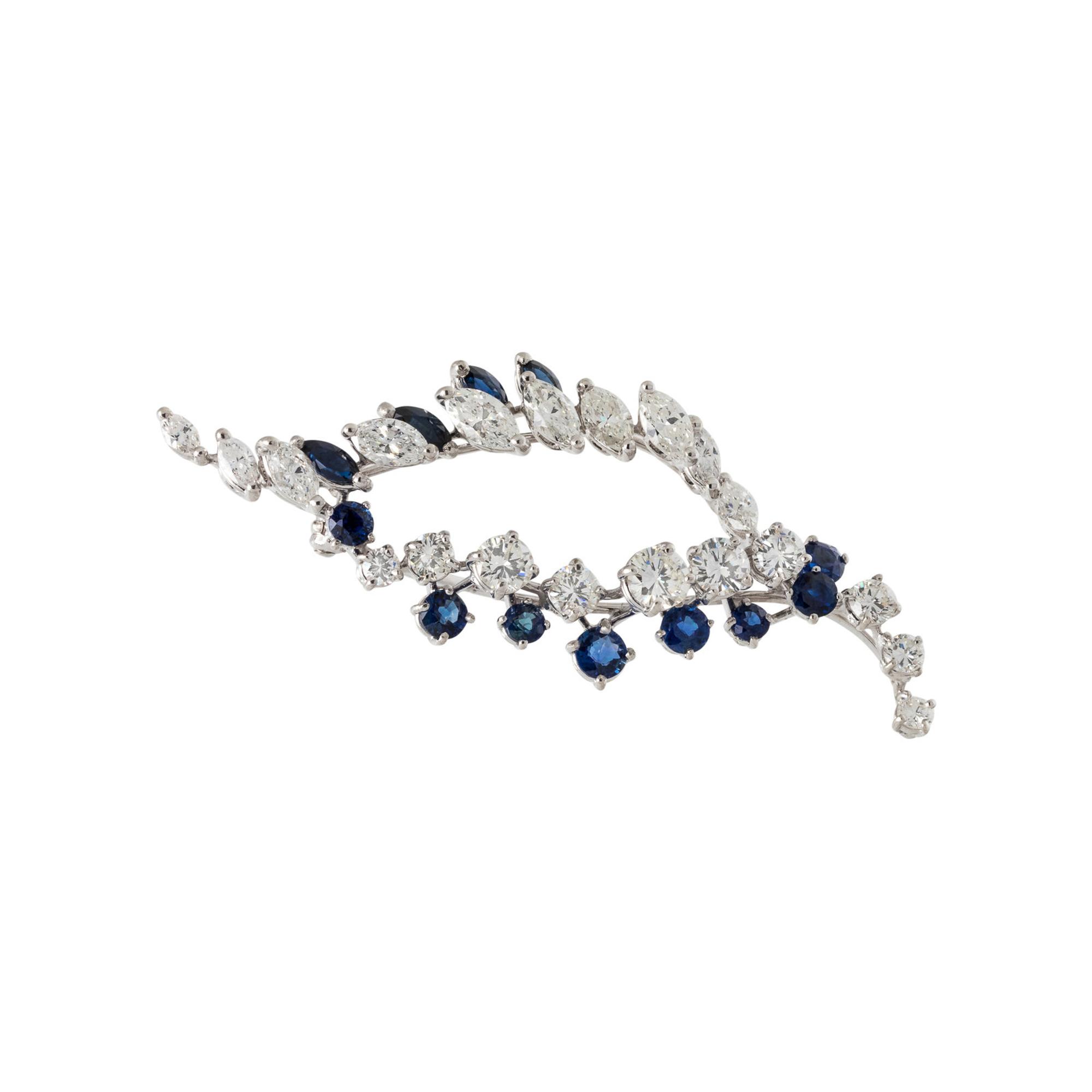 DIAMOND AND SAPPHIRE BROOCH WITH YELLOW GOLD JACKET