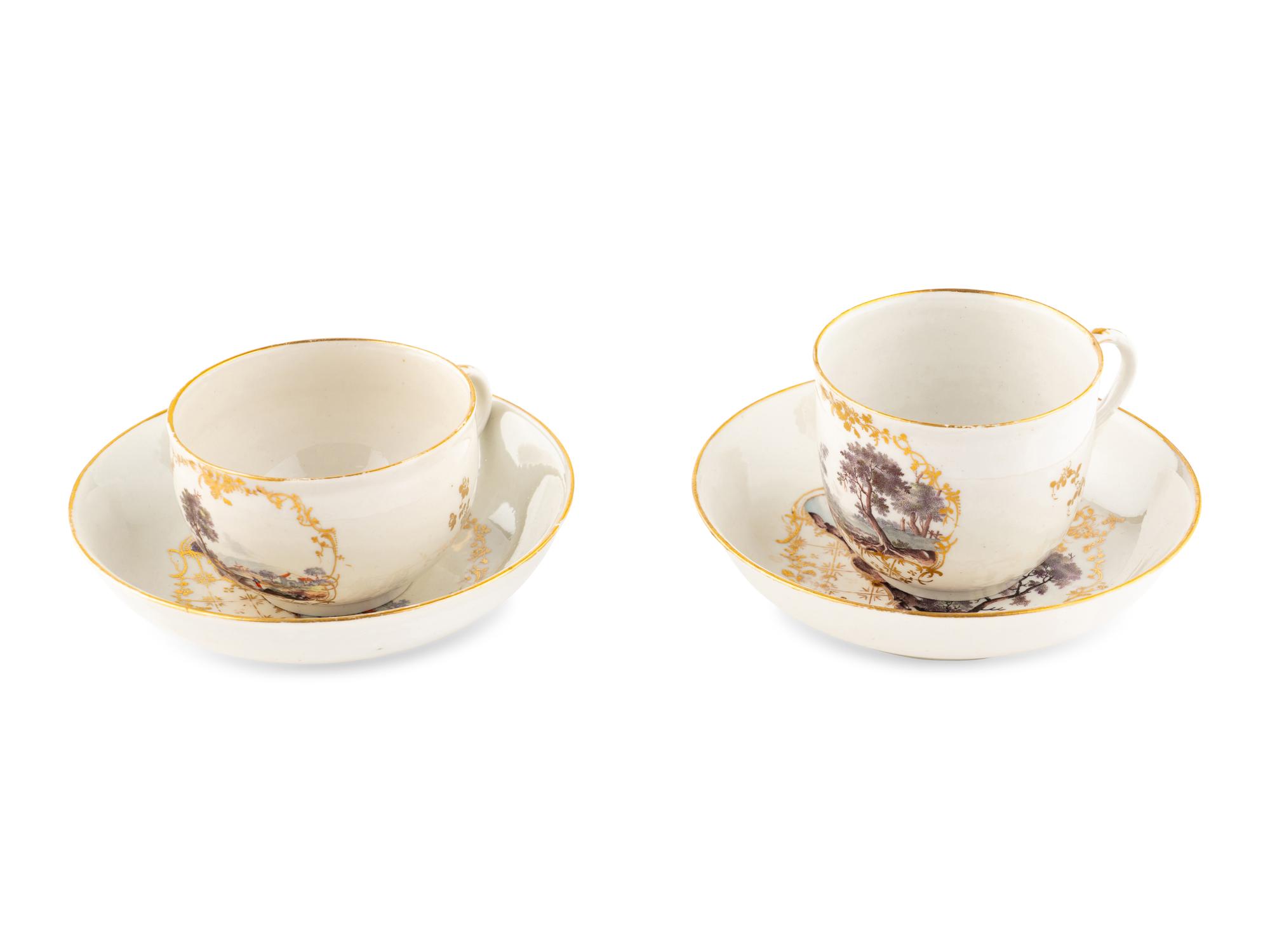 A Near Pair of South Italian Porcelain Teacups and Saucers