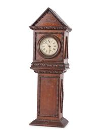 A Miniature Carved Tall Case Clock