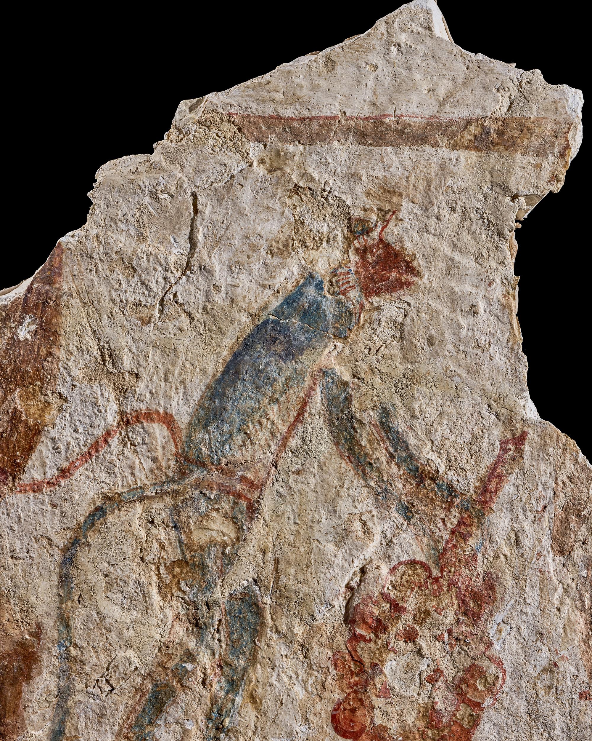 An Egyptian Painted Limestone Fragment