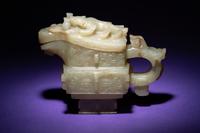 A Chinese Archaistic Pale Celadon Jade Wine Vessel, Gong