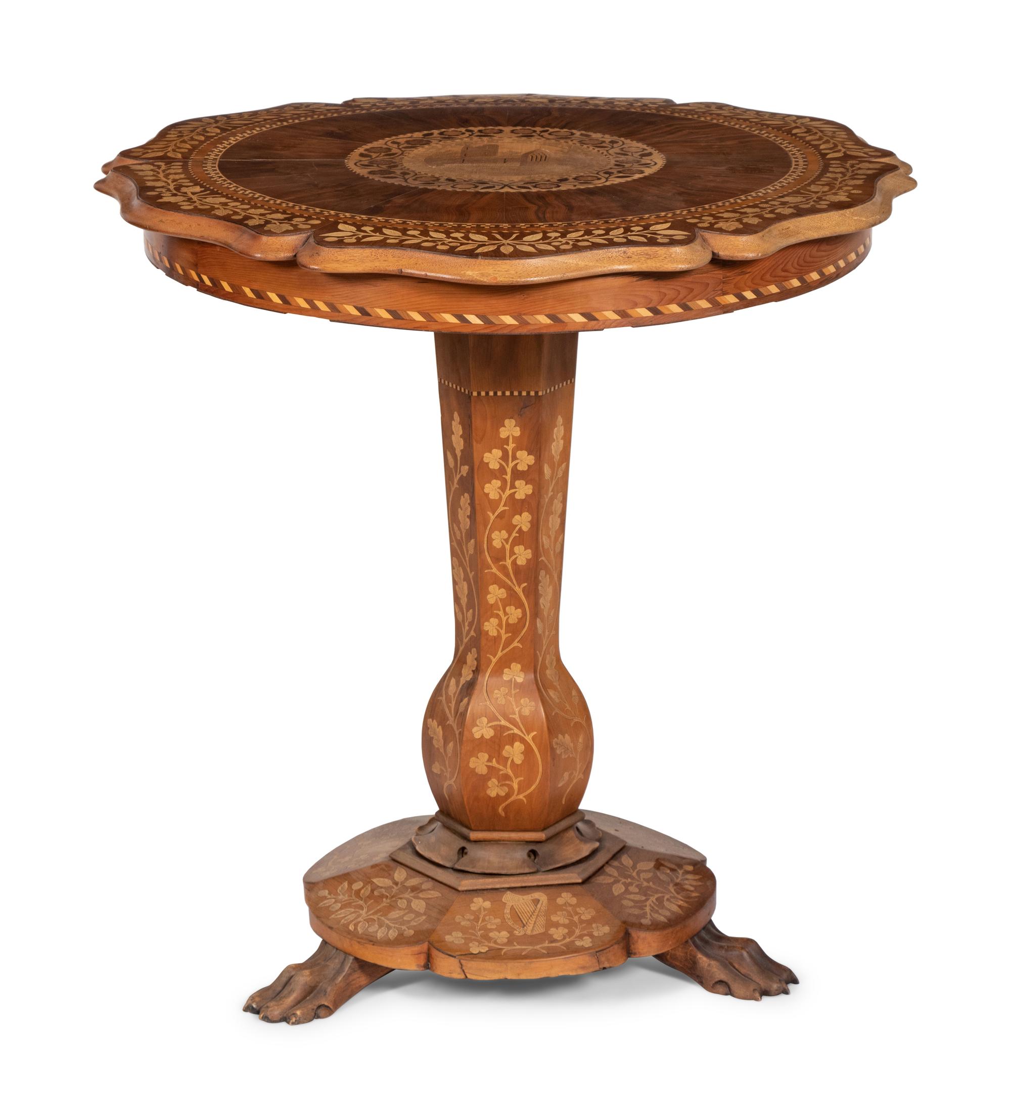 A Continental Marquetry Table on Claw Feet