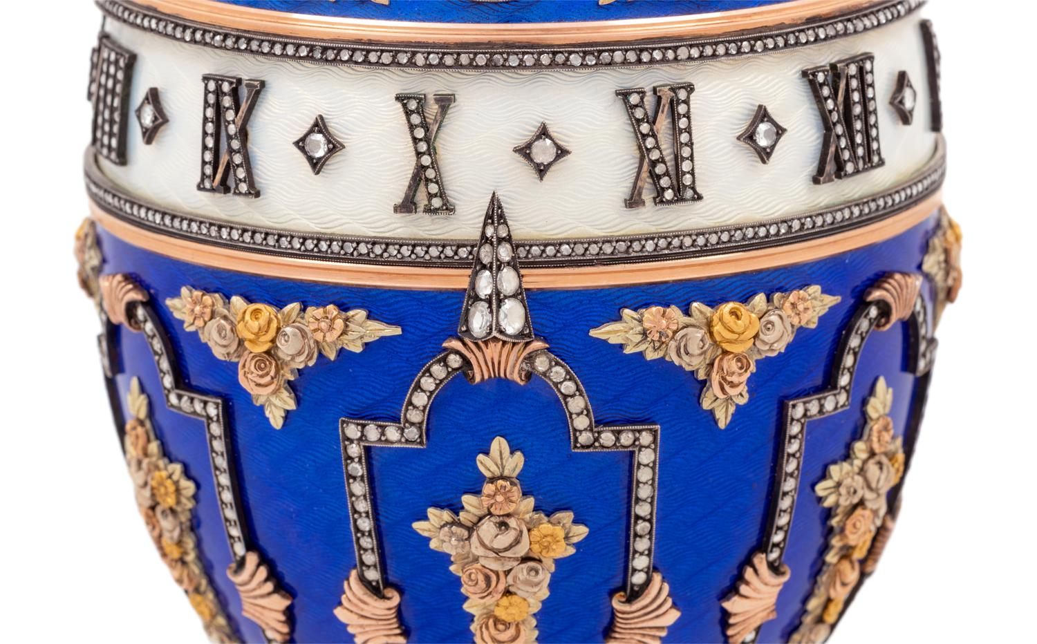 A Gold, Enamel and Diamond Inset Egg-Form Annular Clock