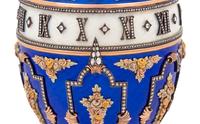 A Gold, Enamel and Diamond Inset Egg-Form Annular Clock