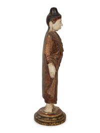 An Indonesian Carved and Painted Figure of a Buddhist Monk