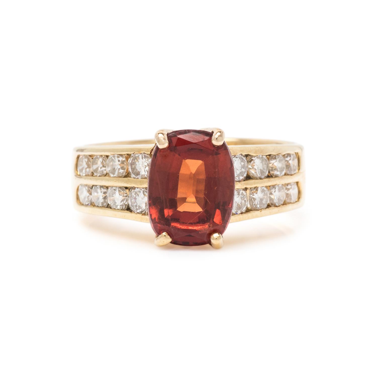 ORANGE GARNET AND DIAMOND RING