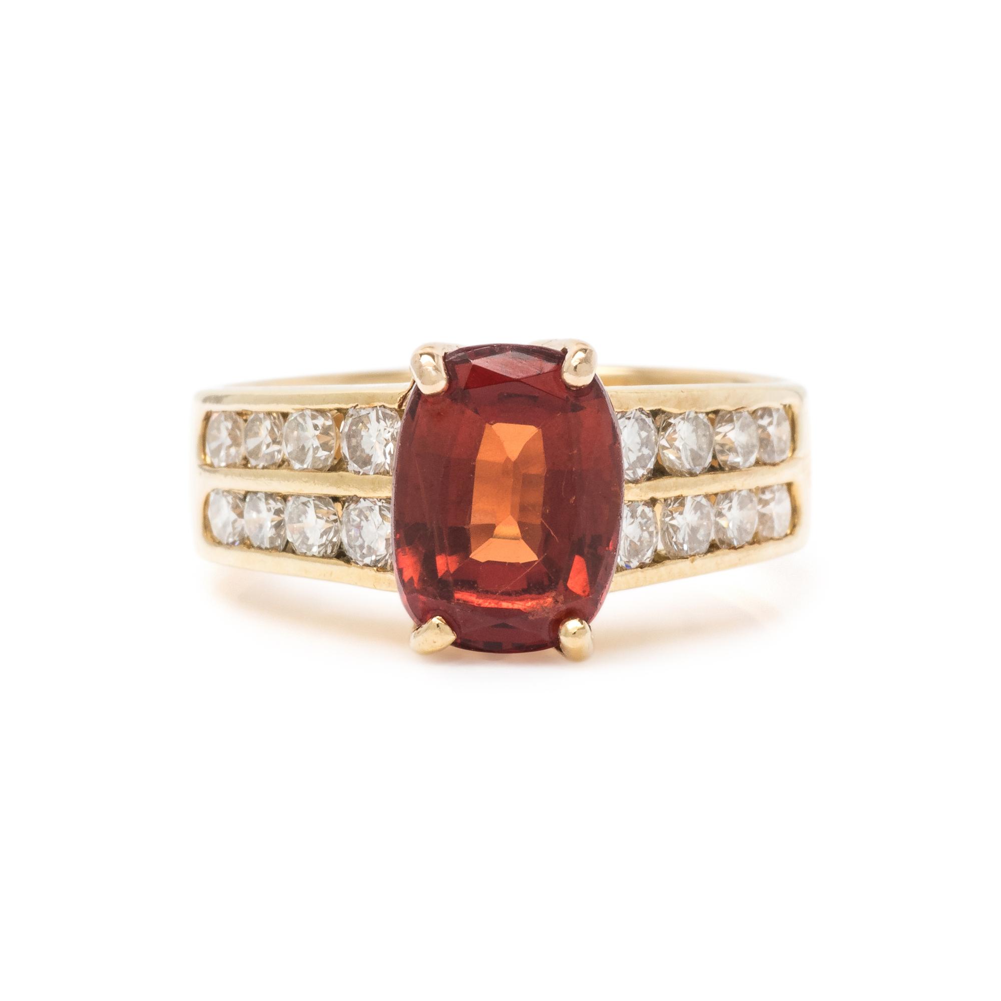 ORANGE GARNET AND DIAMOND RING