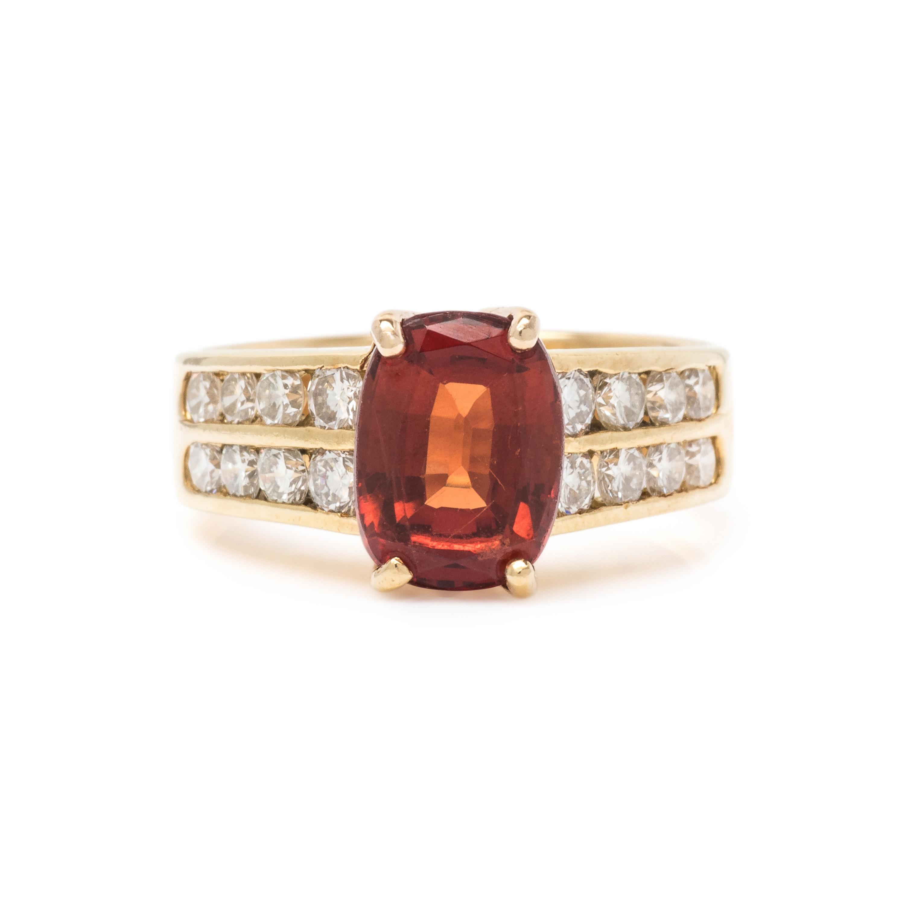 ORANGE GARNET AND DIAMOND RING