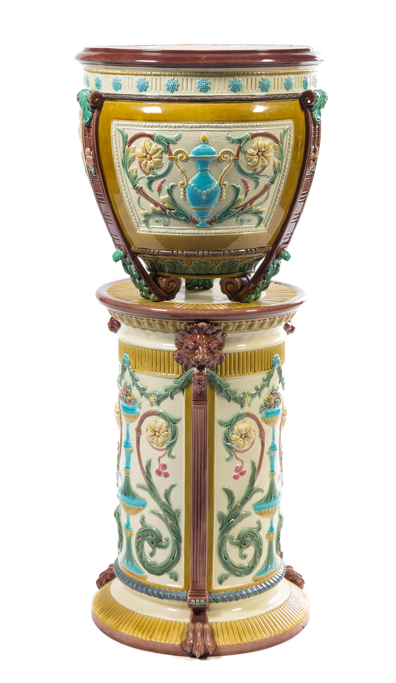 A Continental Majolica Jardiniere and Pedestal Height overall 41 inches.