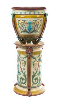 A Continental Majolica Jardiniere and Pedestal Height overall 41 inches.