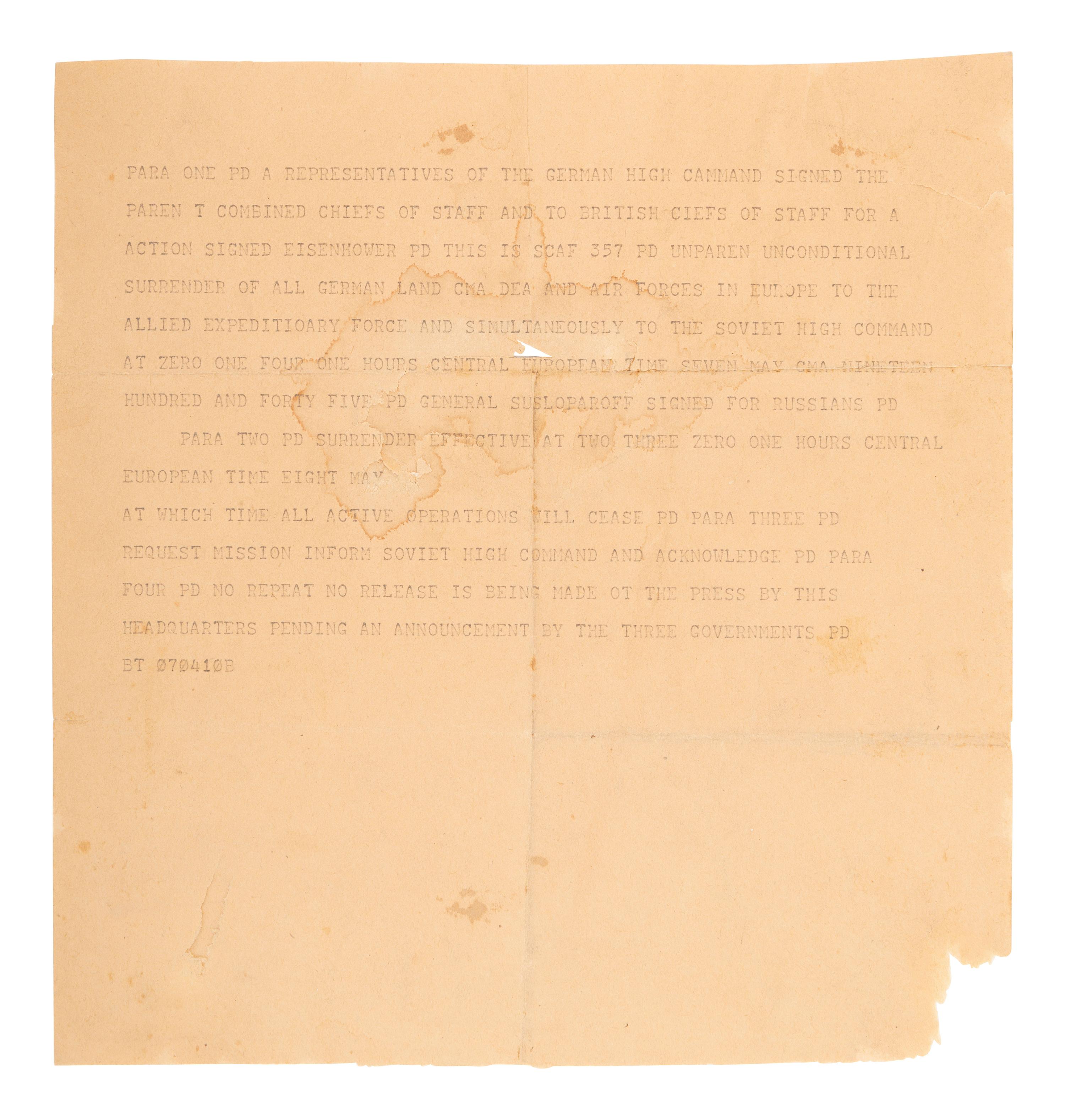 [WORLD WAR II]. Original cable from Reims announcing the German military's unconditional surrender. 7 May 1945.