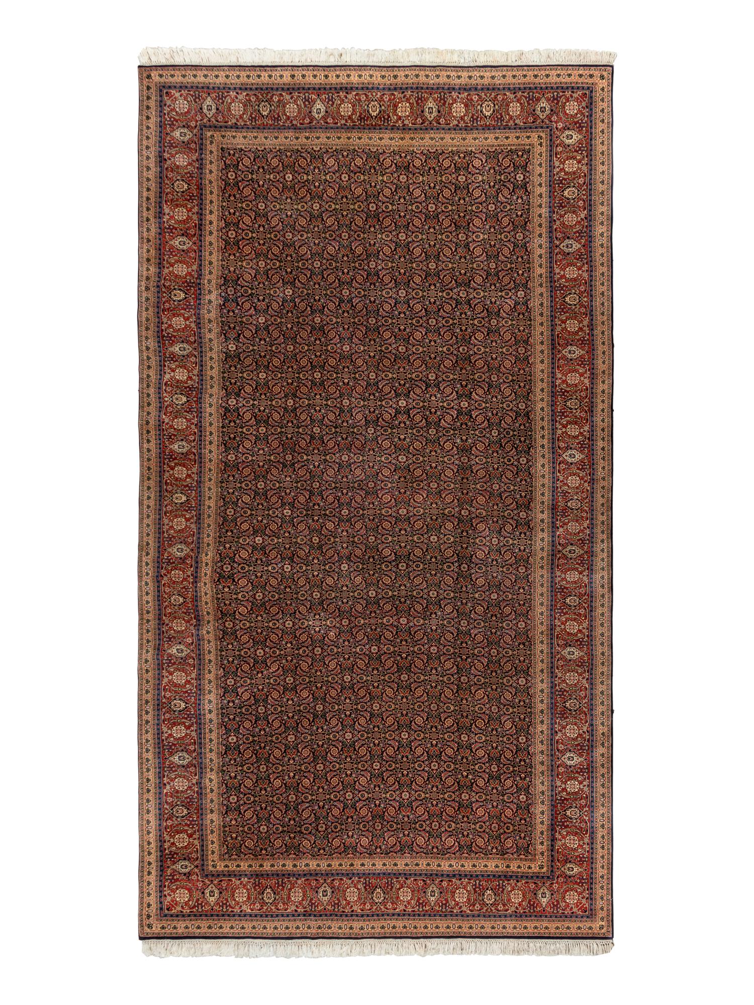 A Persian Meshed Wool Rug